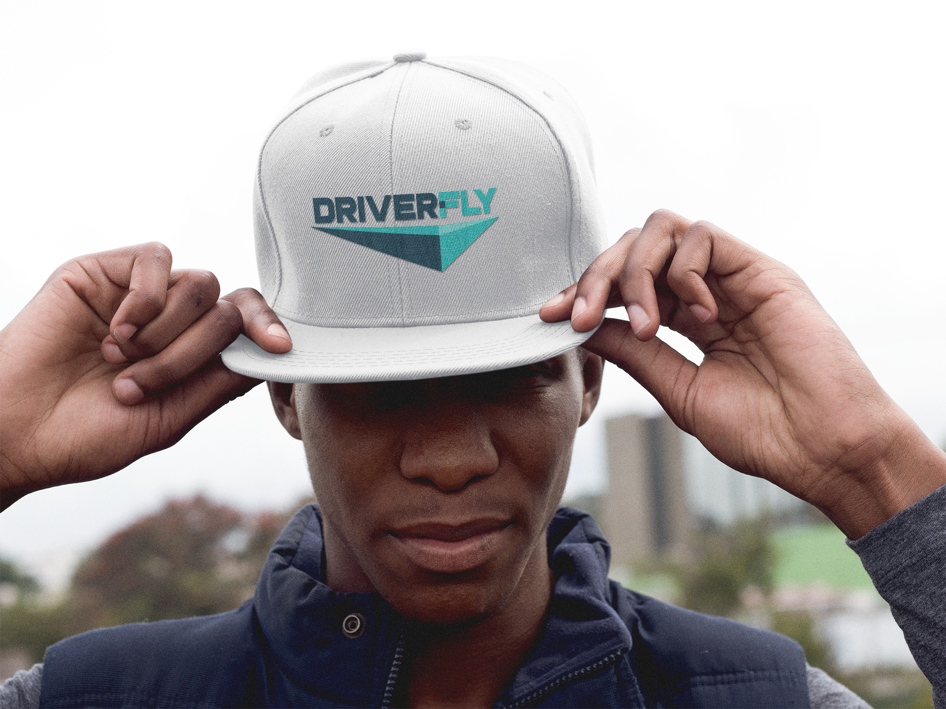 Truck driver wearing DriverFly cap